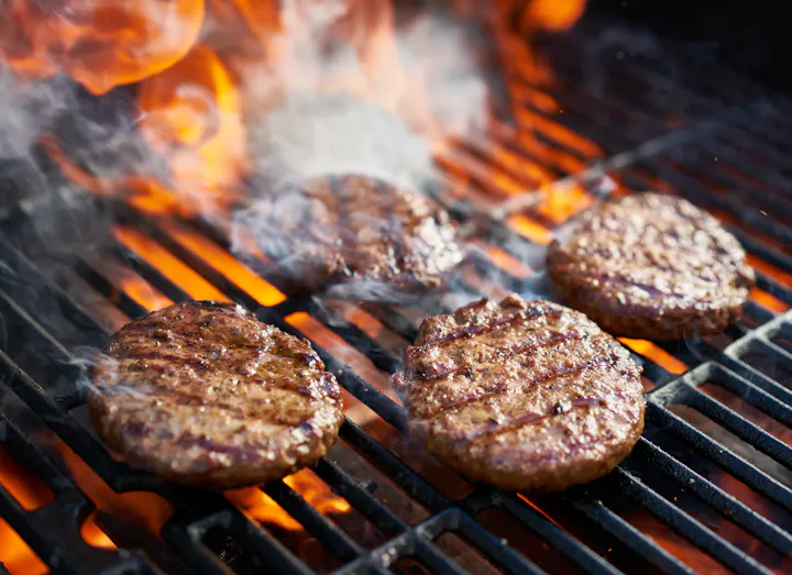 Burger patties on the grill