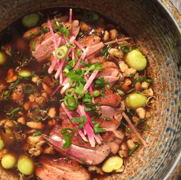 Smoked Magret Duck Breast with Black Pepper Spaetzle, Shaved Brussels, Roasted Pumpkin, Black Garlic Broth