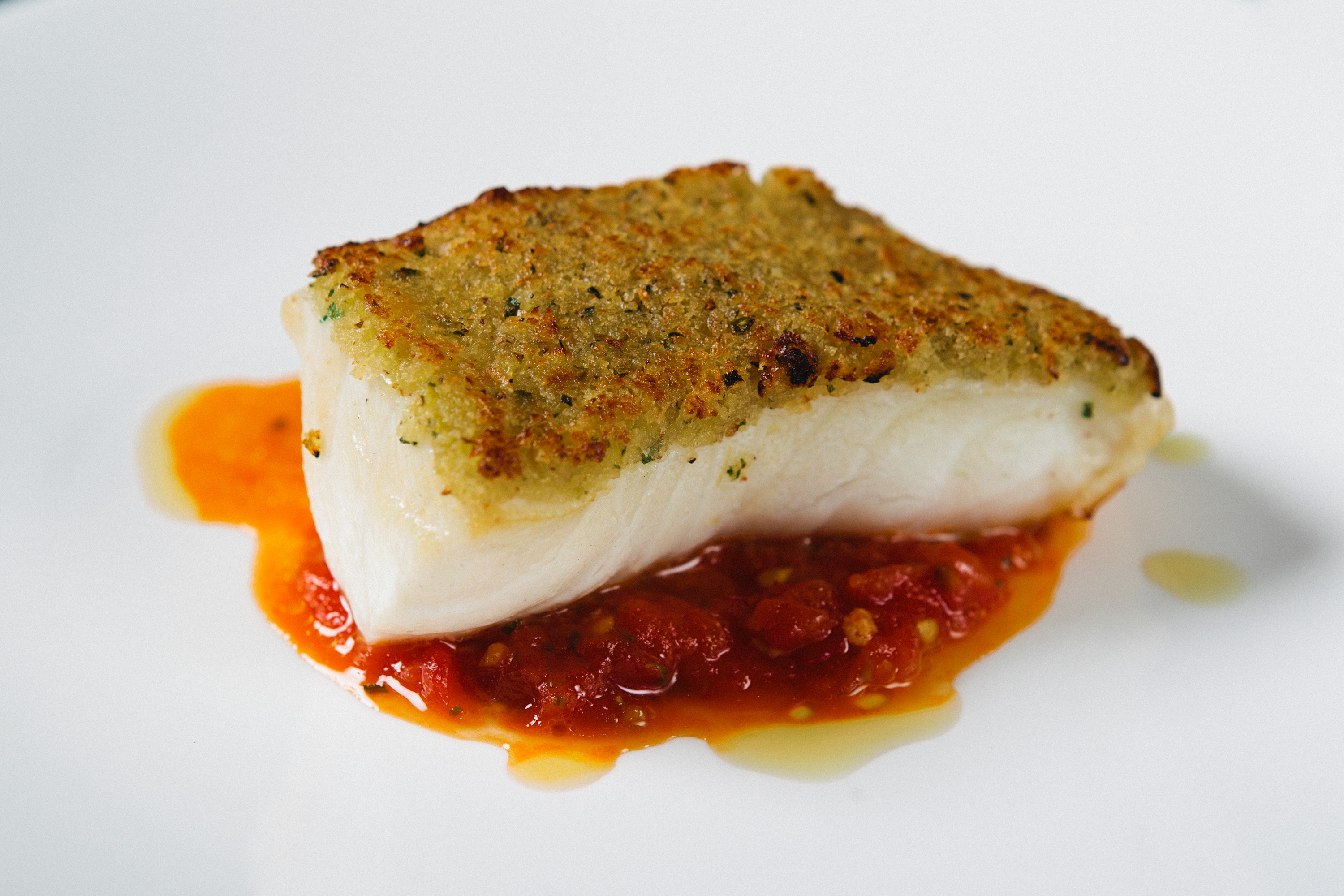 Herb Crusted Sea Bass with Roasted Tomato Sauce