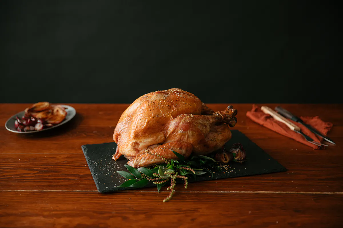 Roasted whole turkey on a slate board