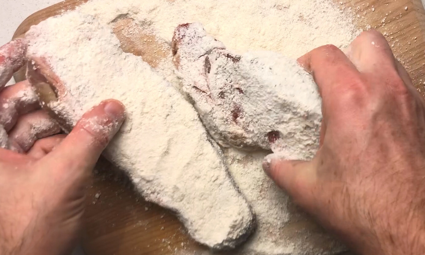 Rubbing the Koji powder onto a steak