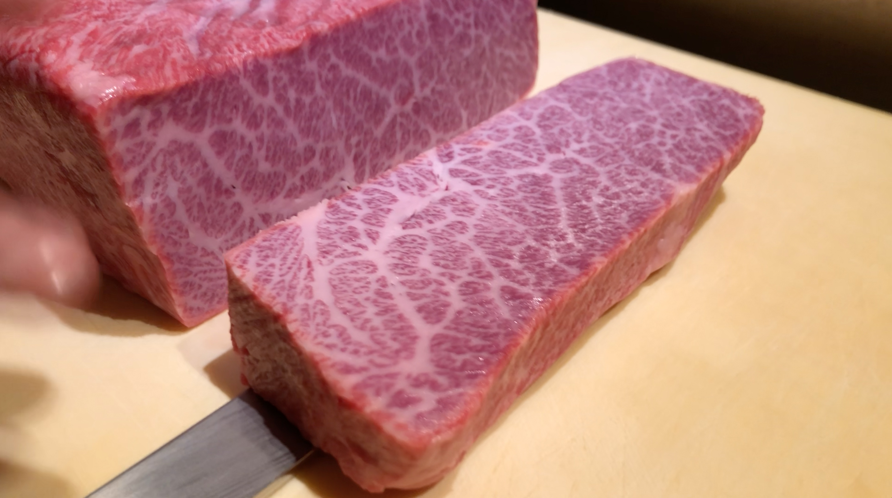 Slicing through the Hida-gyu A5 Wagyu