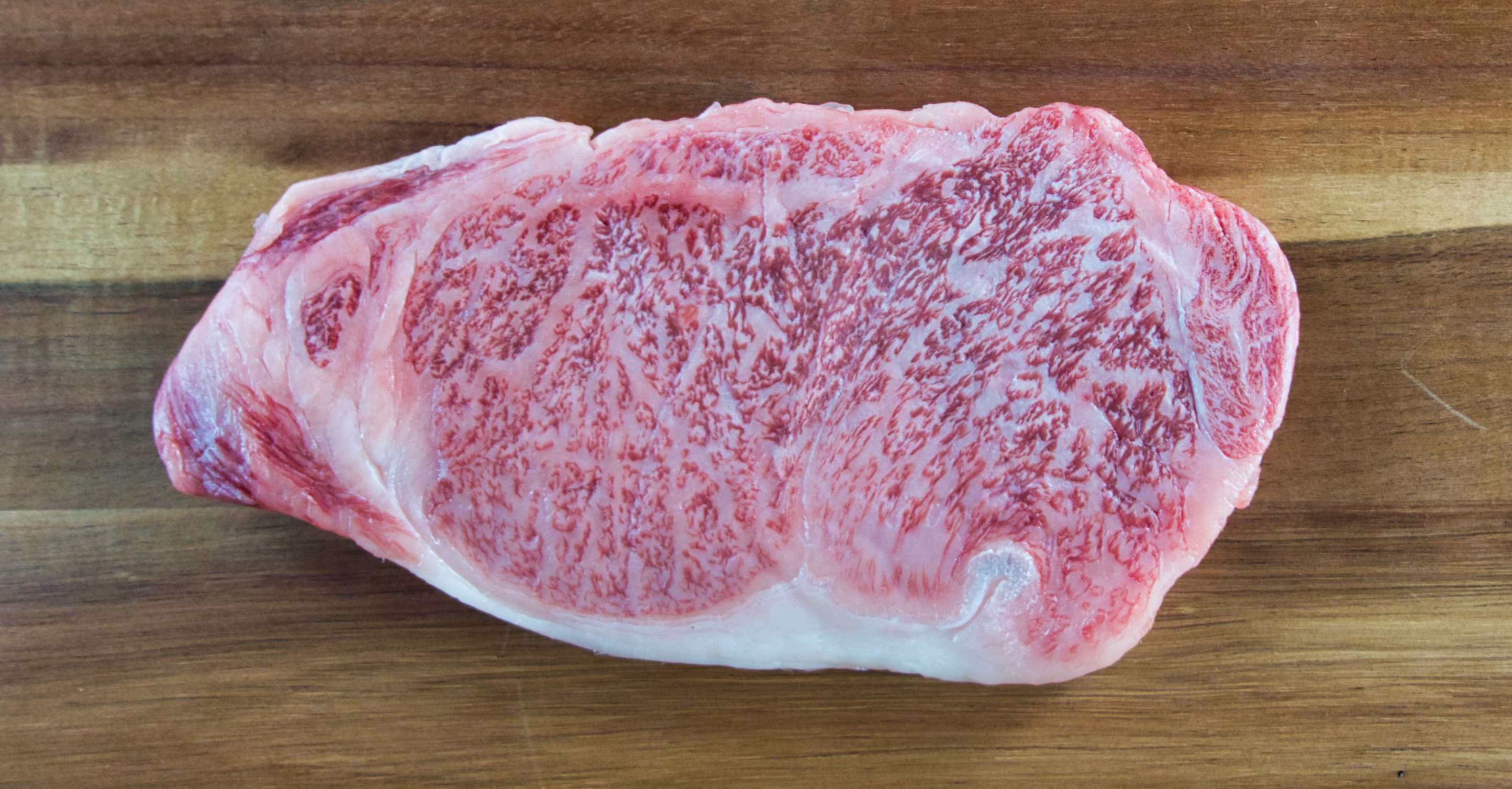 What's written on the Olive Wagyu seal?